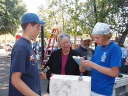 Analy High School students, Sara Schomp, carve peace sculpture.