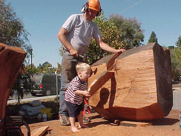 BruceJohnson.son.eats.wood